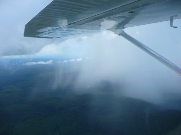 So cool to be flying right by a huge thunderstorm over the jungle!