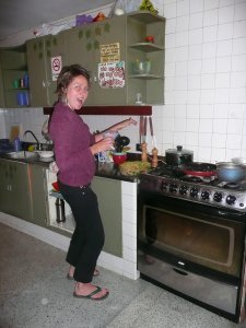 Lovely Laura from Australia in our Casa Kiwi kitchen in Medellin preparing a yummy meal of fresh veggies!