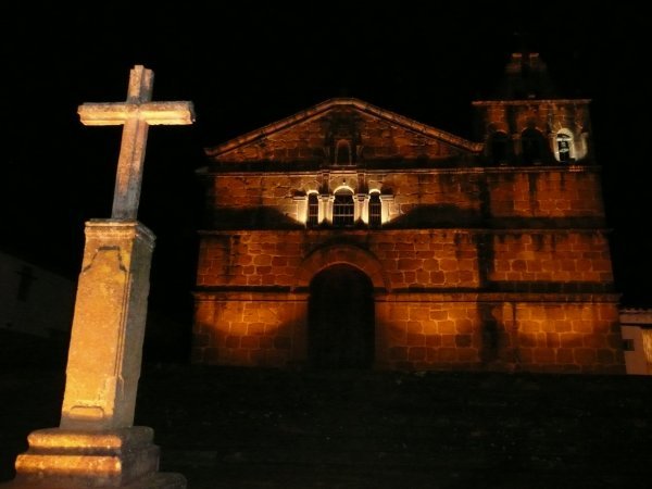 One of Barichara's old churches lit up at night.
