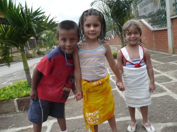 Sergio, Eliana, and Liset being nice to each other on the walk back home from the pool. 