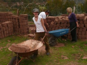 Some days the volunteers helped in the classroom...other days they helped with construction. Like hauling hundreds of mug bricks in wheel barrows! Those bricks are heavier than they look...especially in the noonday sun...especially after going out all nig