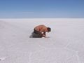 looking for salt crystals in Salar de Uyuni, Bolivia