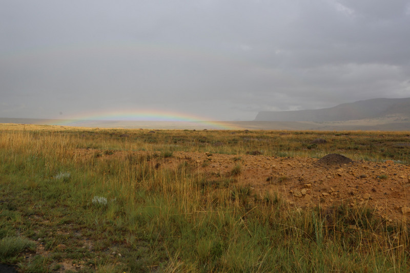 rain in the national parc with a rainbow