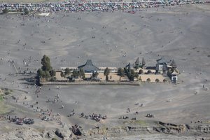 view from the crater rim down to the hindu temple in the sea of sands
