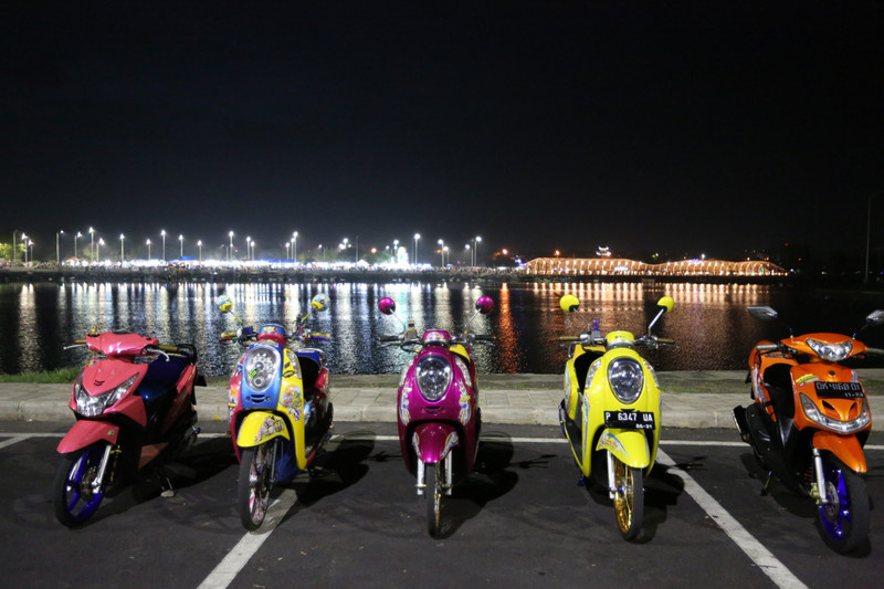 the local scooter gang showing off at Pantai Boom