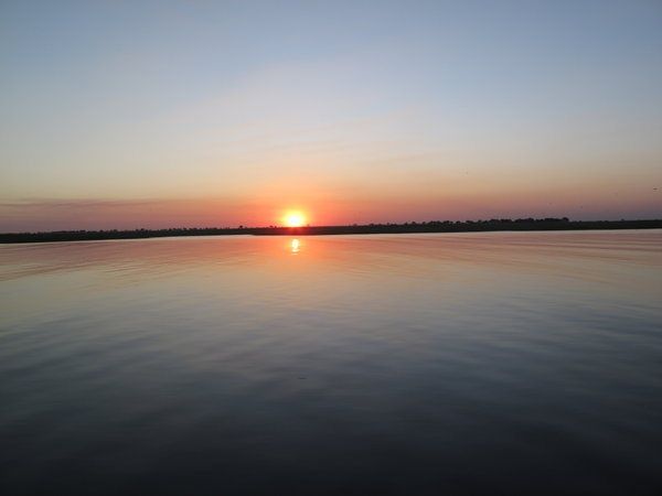 Sunset auf dem Chobe River im Boot