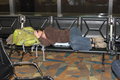 Nina trying to get some sleep at the airport