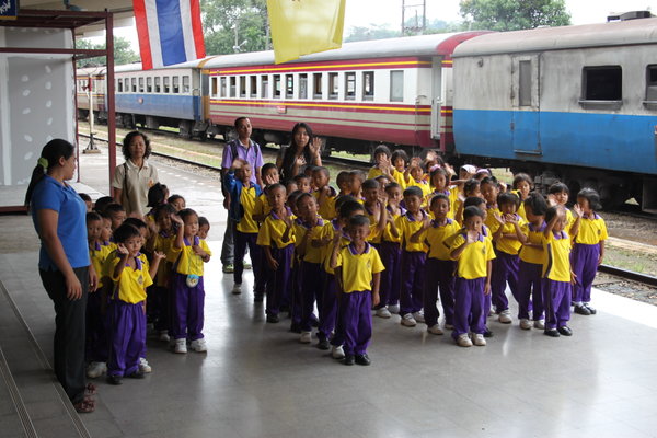 a school class visiting the train station