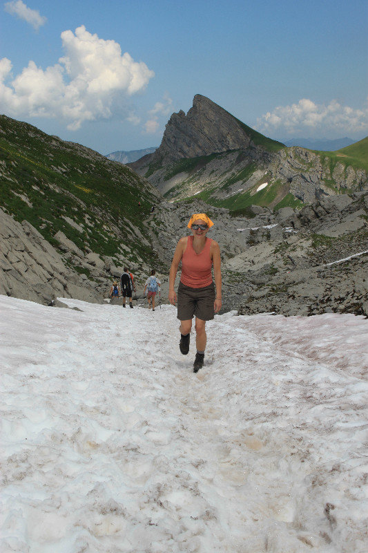 crossing a snowfield while trekking in the Berner Oberland