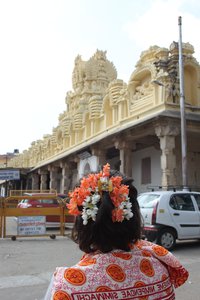 lady decorated my hair with flowers before entering the Cheluvanarayana Temple in Melkote ;-)