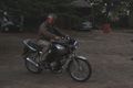 Markus on the motorbike before sunrise