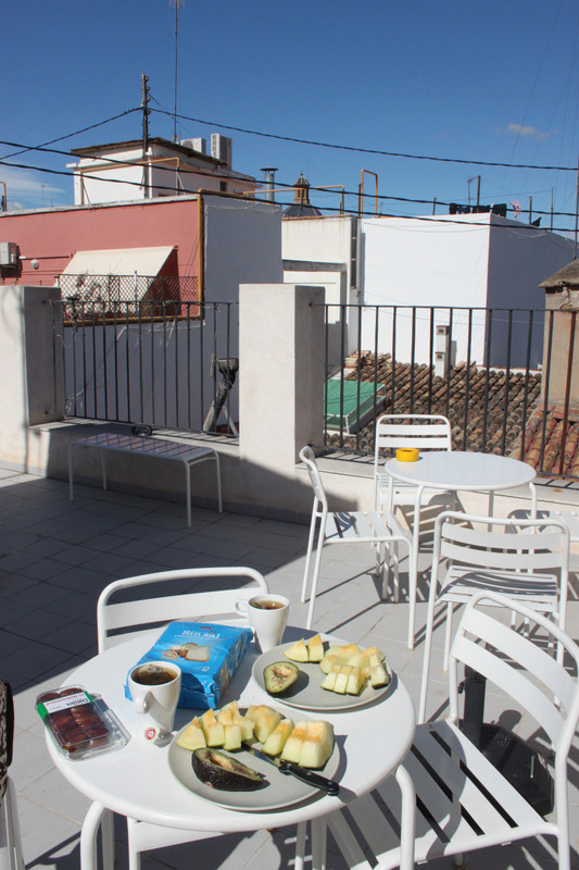 having breakfast on the roof top terrasse of the Hulot B & B