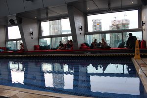 rooftop pool with a stunning view at the Traders Hotel