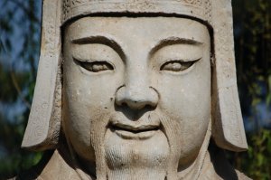 A close up of one of the statues on the avenue to ming tombs