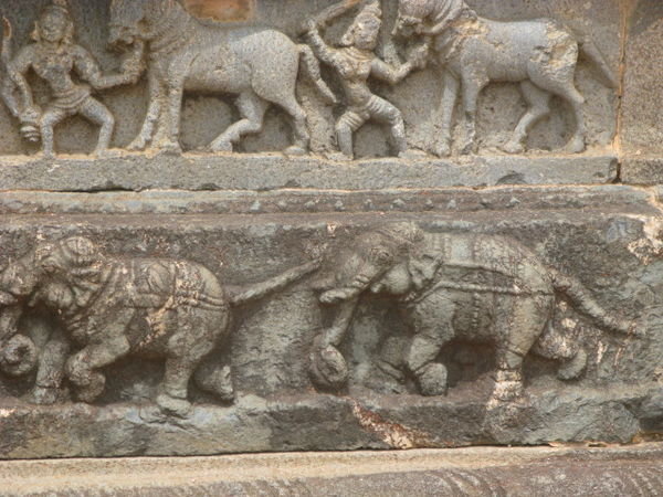 Temple carvings depicitng elephant styley battles -Hampi
