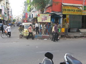 army of tuk tuk drivers waiting to pounce at the bottom of our road in Chennai
