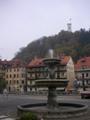 The castle overlooking town, fountain