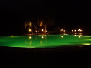 pool at night - green water
