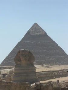 The Sphynix with the Pyramids of Giza in the background