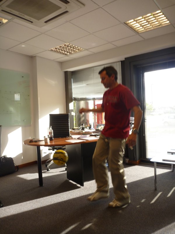 Federico about to launch a football at a coworker