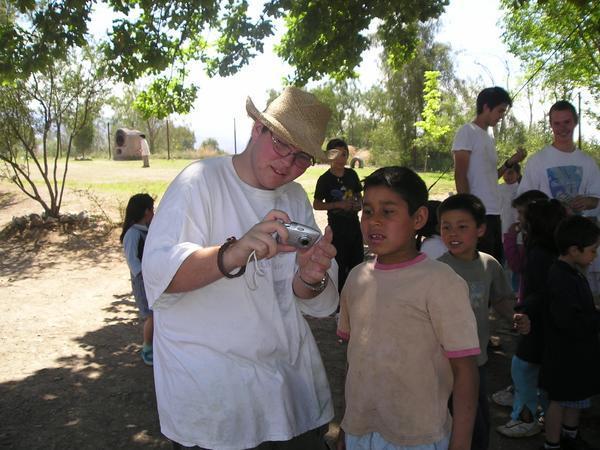 Noah Shows A Boy His Camera