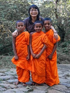 Lisa and three young monks
