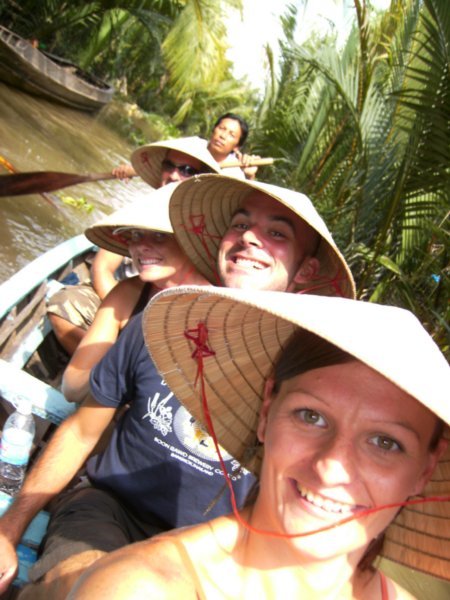 Rowing boat on the Mekong Delta
