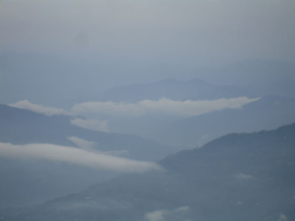 Atmospheric view of Mountains with low cloud