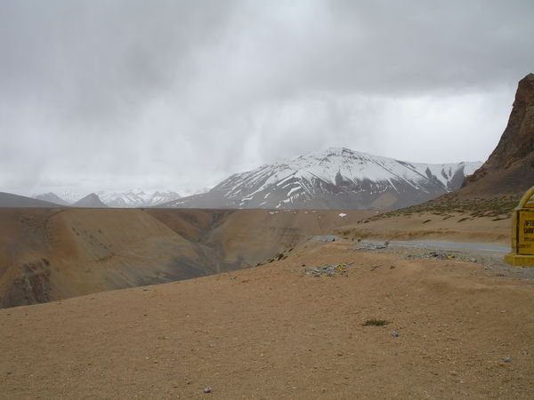 Barren landscape with Himalayas in background