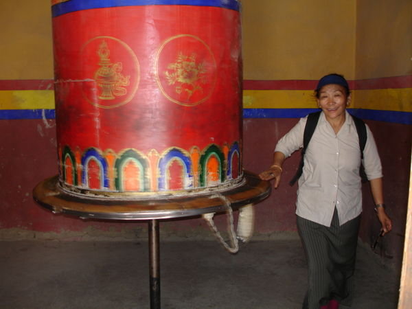 Dolma, our guide, with large prayer wheel