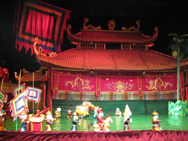 Watching a traditional Vietnamese water puppet show