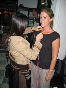 Amy being measured for her suit!