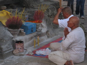 Buddists praying to the Angkor gods...