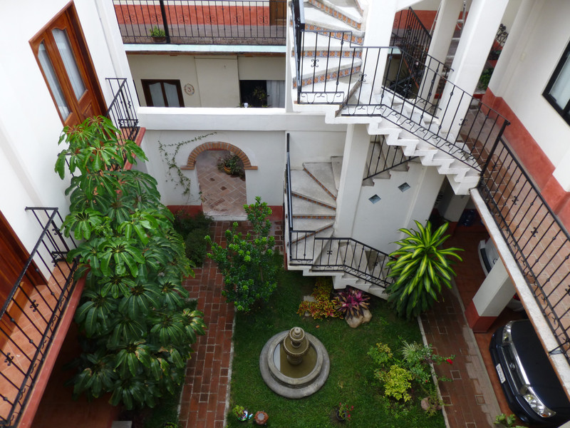 Looking Down Into The Courtyard From The Terrace Of My First Place