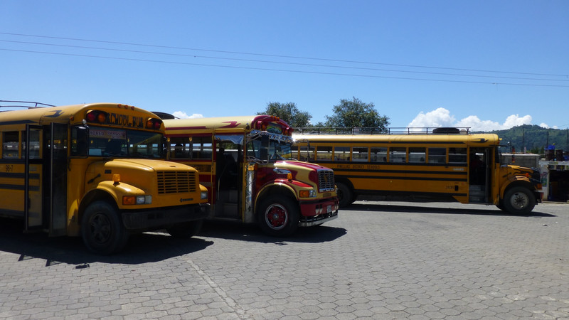 Three ex-US school buses