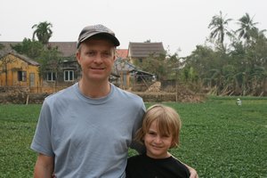mark and nathan in front of rice field