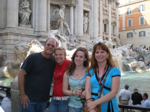 The fam at Trevi Fountain