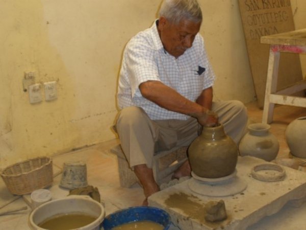 Old man at the pottery place
