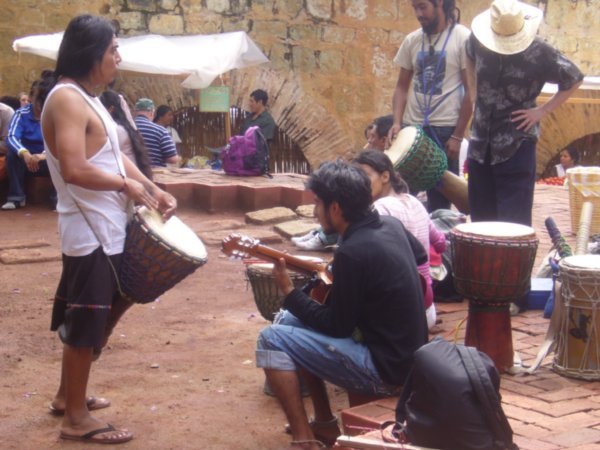 Locals perform African dance/music