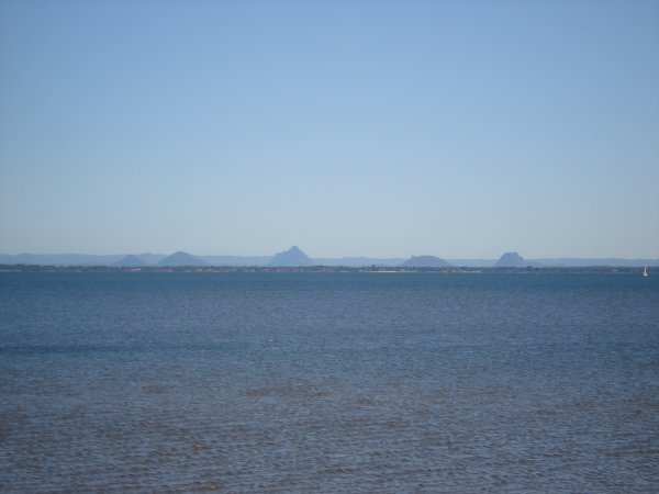 View of the Glass-House Mountains from Redcliffe in the sunshine
