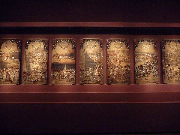 Series of panels depicting Cortez' conquering of South America