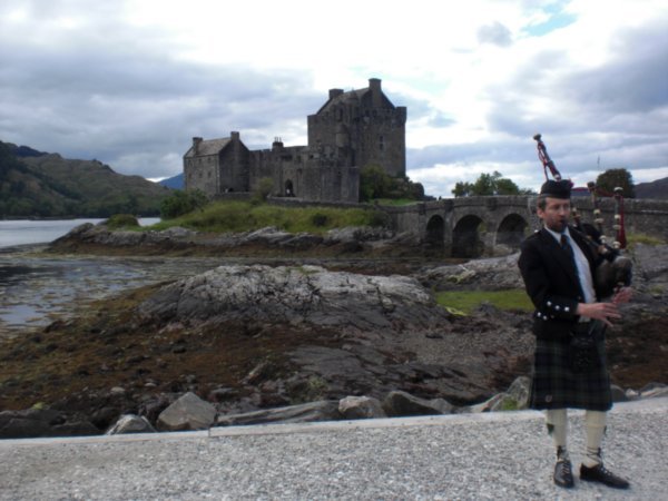 a Mackenzie piper at Eilean Donan Castle