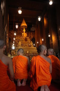 Monks Praying at Temple