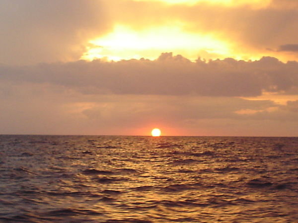 Sunset Off the Sailboat