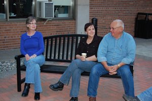 College of Scholastica: Alyce Ecklund and  Bruce and Sharon Walth share stories late in the evening.