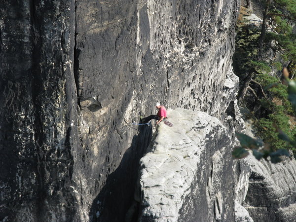 A crazy rock climber.