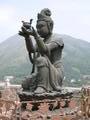 Random Buddha-worshiping statue