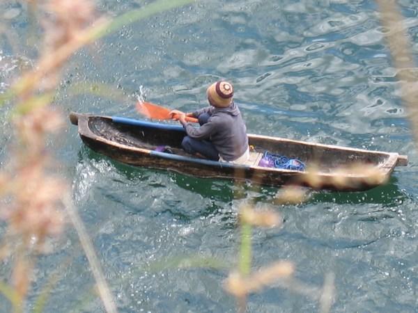 little man in the canoe