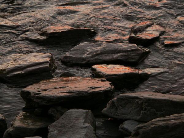 Rocks reflecting the sunset