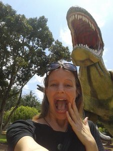 Who doesn't take a selfie when they're fleeing a dinosaur?